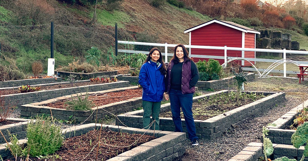 Anika and Lindsey in the Vista Community Garden