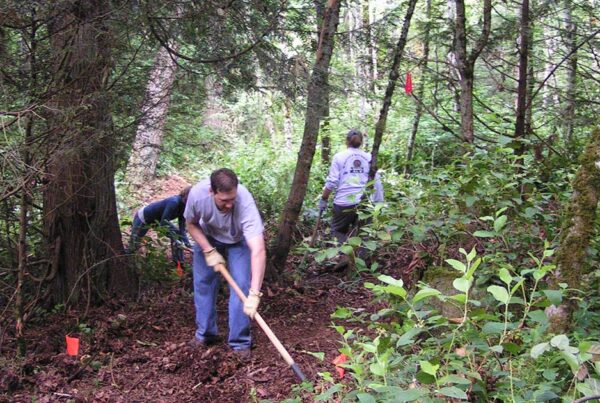 Committee members help build the Grand Ridge connector trail